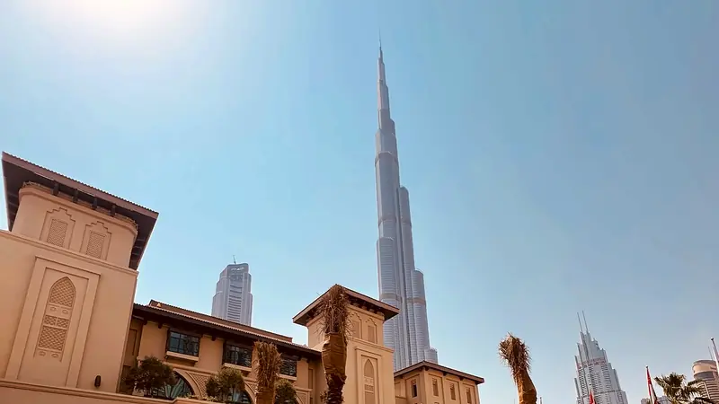 A traditional-style courtyard in Downtown Dubai with the Burj Khalifa behind